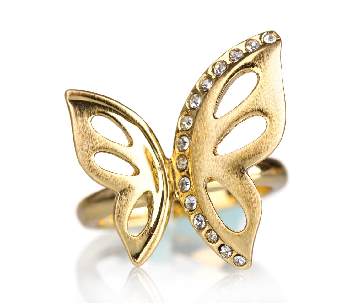 butterfly ring made of gold with diamonds on one wing